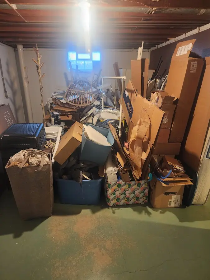 Roll-off dumpster container at job site for 2 Yard Dumpster Rental in Tallassee